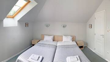 Фото номера Двухместный номер Делюкс в мансарде Гостевой дом Da Vinci Guesthouse г. Выршец 4
